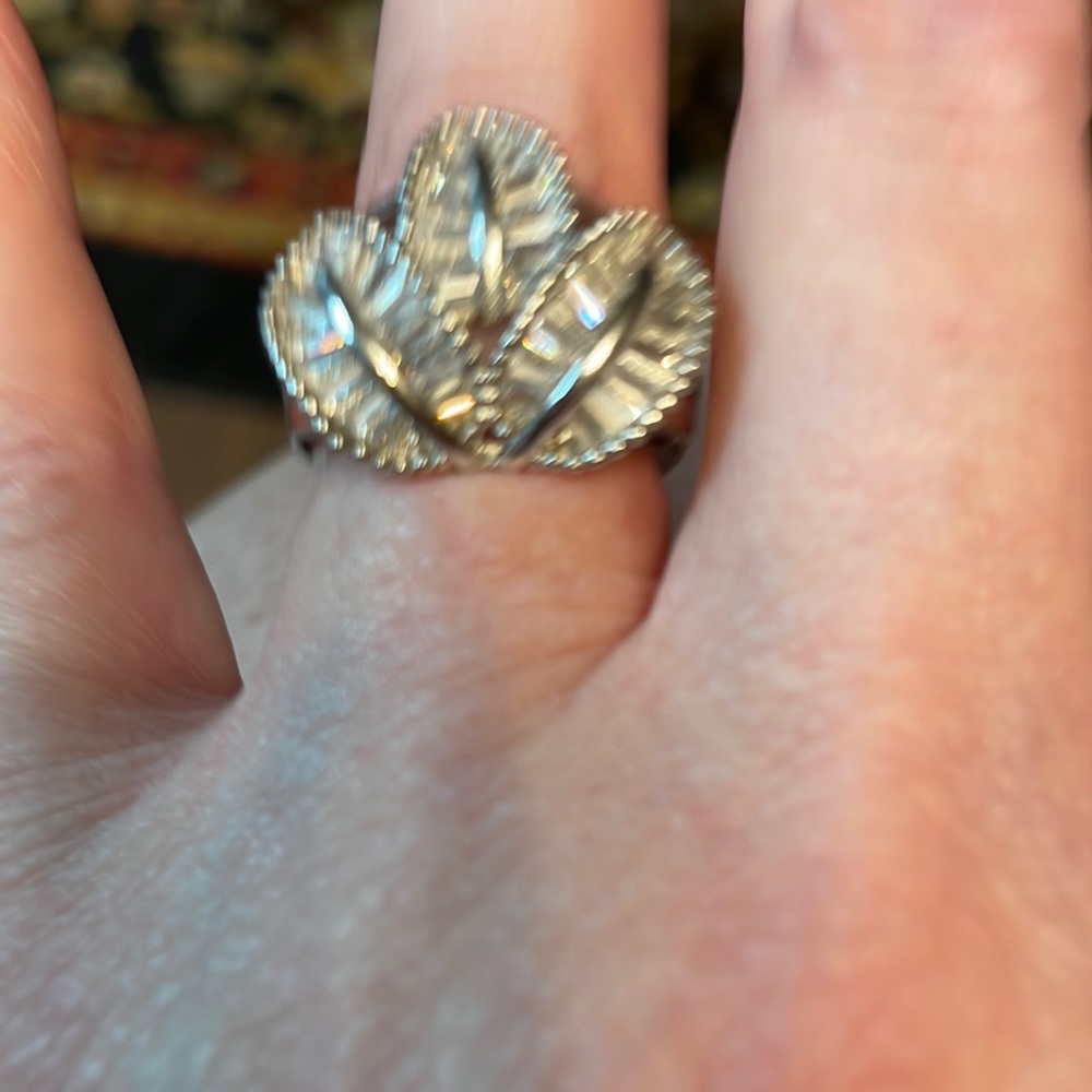 This is 925 sterling silver ring of all clear stones not diamonds.